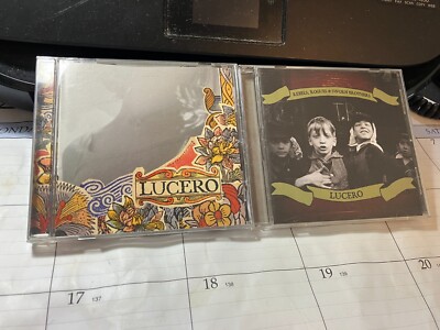 LUCERO 2 CD LOT: THAT MUCH FURTHER WEST + REBELS, ROGUES & SWORN BROTHERS
