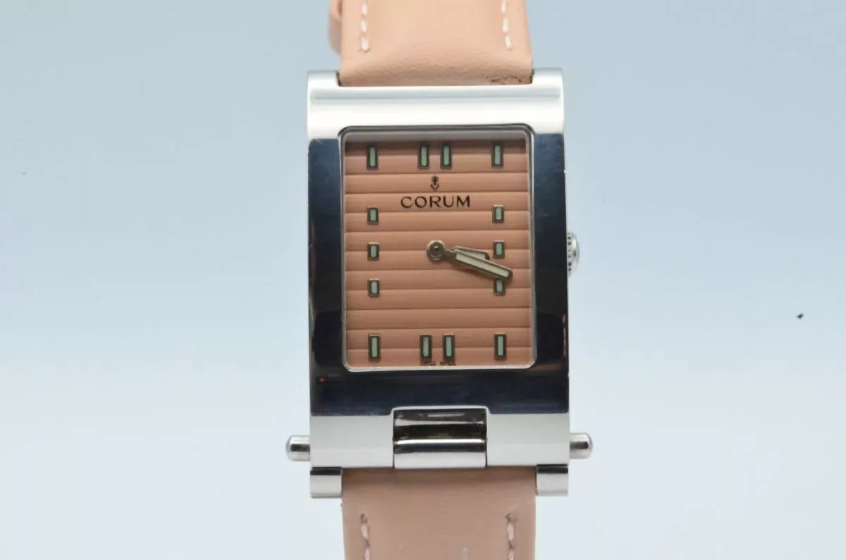 Montre corum homme sale