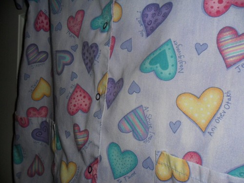 "SIMPLY BASIC" SCRUB TOP. SNAP DOWN, SHORT SLEEVE. SZ. MED - LARGE (SEE SUMMAR - Picture 2 of 8