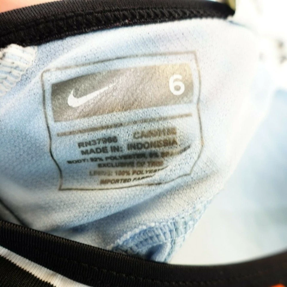 Camiseta sin mangas deportiva Nike Racerback para mujer 6 negras a rayas acolchada Tankini nadar playa Foto 2 de 4