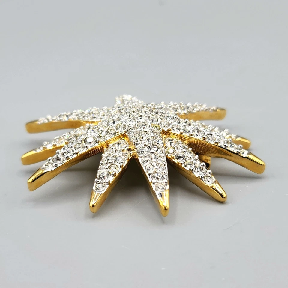 Broche estrella 12 puntos pavé cristal chapado en oro firmado Swarovski Swan Foto 3 de 4