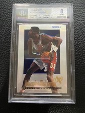 1996  1997 NBA SKYBOX E X2000 #2 CREDENTIALS INSERT DIKEMBE MUTOMBO GRADE 8