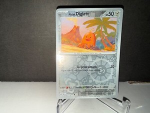 Alolan Diglett 122 2024 Pokemon Surging Sparks Reverse Holo Card NM+