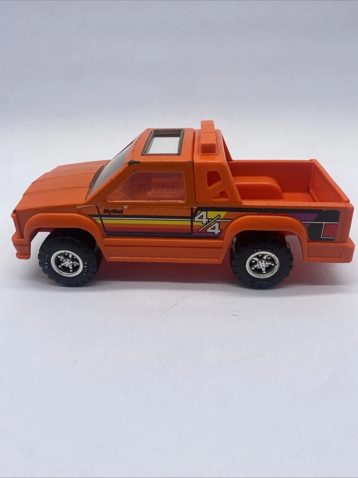 Camioneta pickup NyLint 1989 vintage 4 X 4 naranja acero prensado y plástico techo corredizo Foto 4 de 4