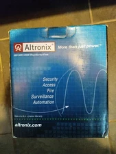 altronix AL125ULP. Power supply/ battery charger 12VDC or 24 VDC @1amp grey.