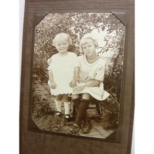 Antique-photograph-Two-young-girls-posing-outdoors-Folded-Cabinet-Card