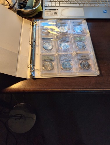 9 morgan silver dollars - all certified pcgs ms63 - in display case with binder - Picture 17 of 17