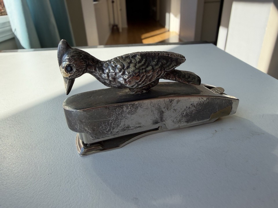 A J.M. Paillard Paris bird-shaped stapler made in France is a sculptural mid-century objet that makes every other stapler on earth look like a crime against design.