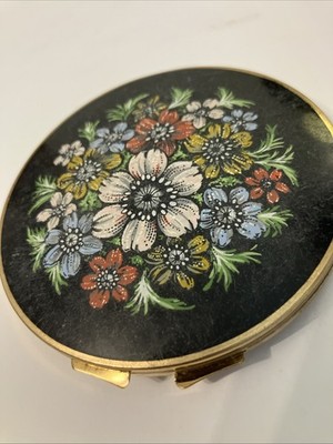 Vintage Stratton powder compact, gold-tone metal case black enamel floral design