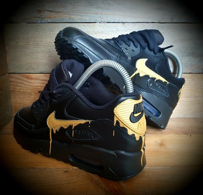 black and gold nikes kids 