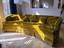 gold mid century vintage curved sofa