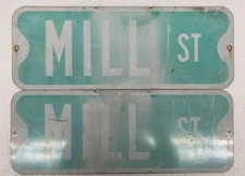 TWO (2) Vtg Retired Heavy Duty 24"x 9" Reflective MILL STREET Highway Road Signs