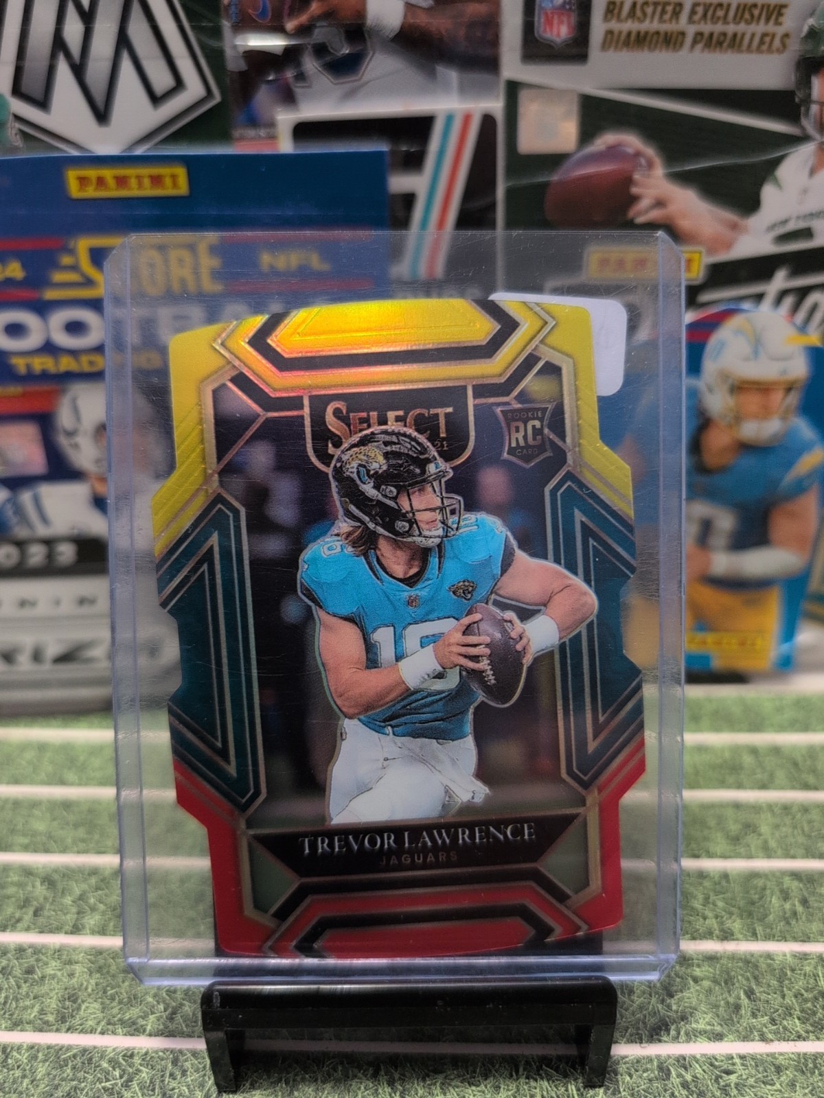 2021 Panini Select Trevor Lawrence Yellow-Red Prizm Club Level Rc Die Cut #243