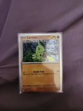 Larvitar Cosmo Holo Pokemon Card 110/193 Paldea Evolved