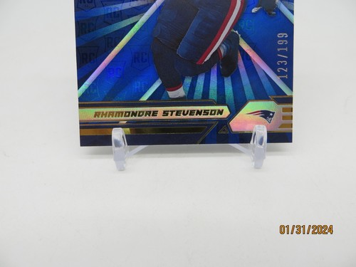 2021 Panini XR Rhamondre Stevenson Rookies blau/99 Patriots - Bild 3 von 6