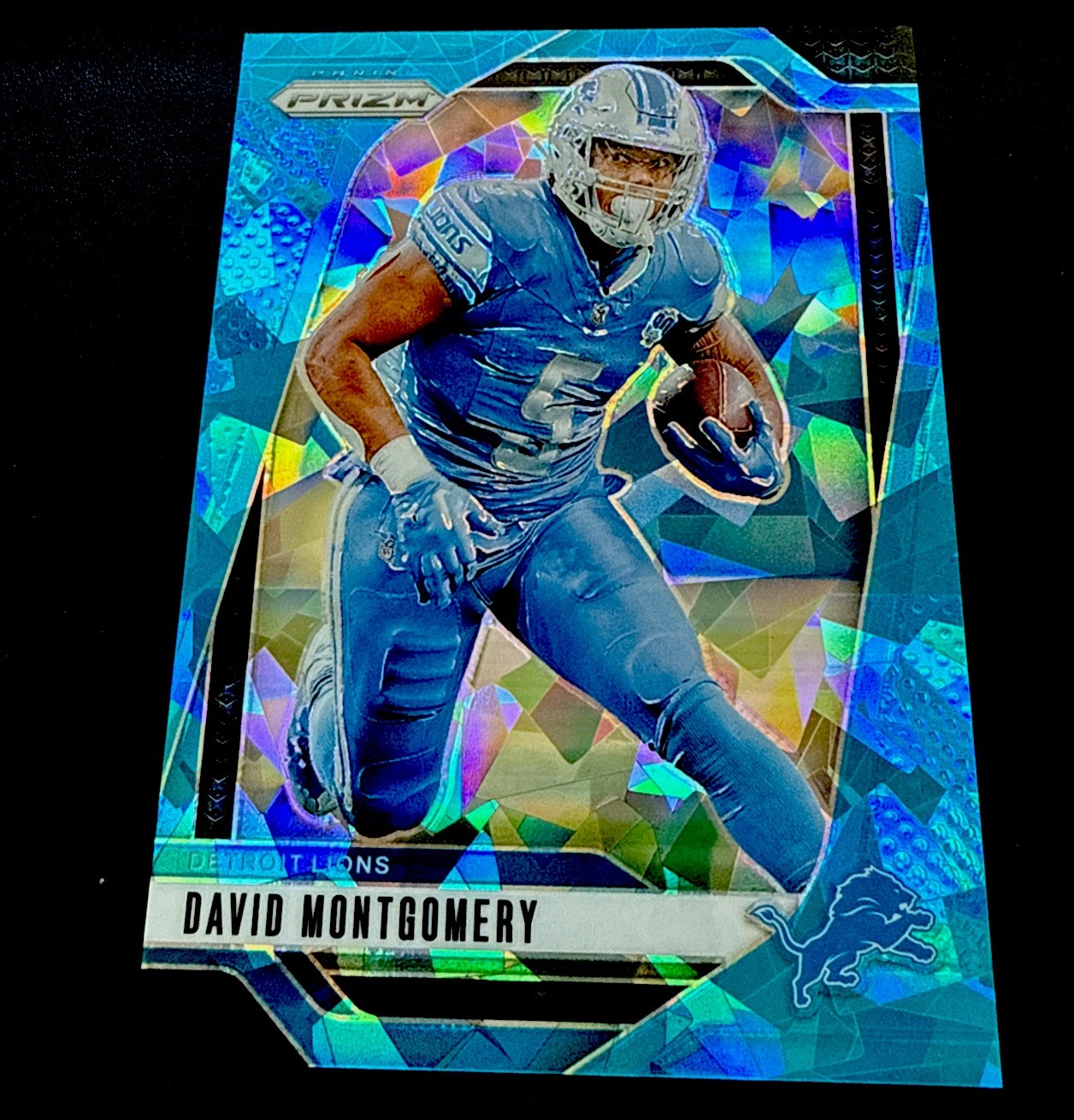 2024 Prizm David Montgomery Cracked Blue Ice /99