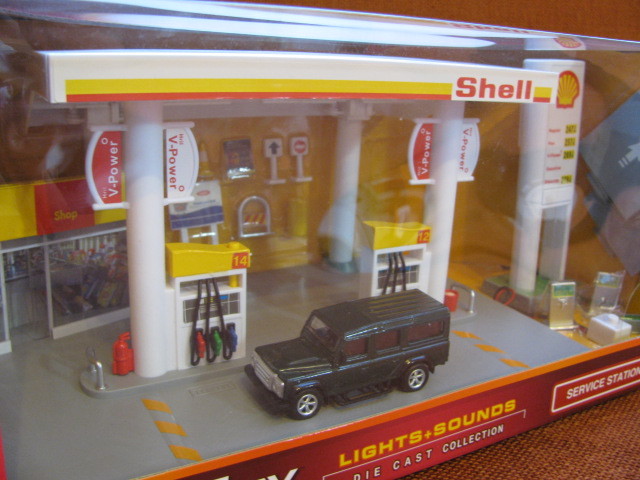 1/64 estación de gas ciudad escena Shell con un solo paquete Modelo-Land Rover 1/64 estación de gas ciudad escena Shell con un solo paquete Modelo-Land Rover