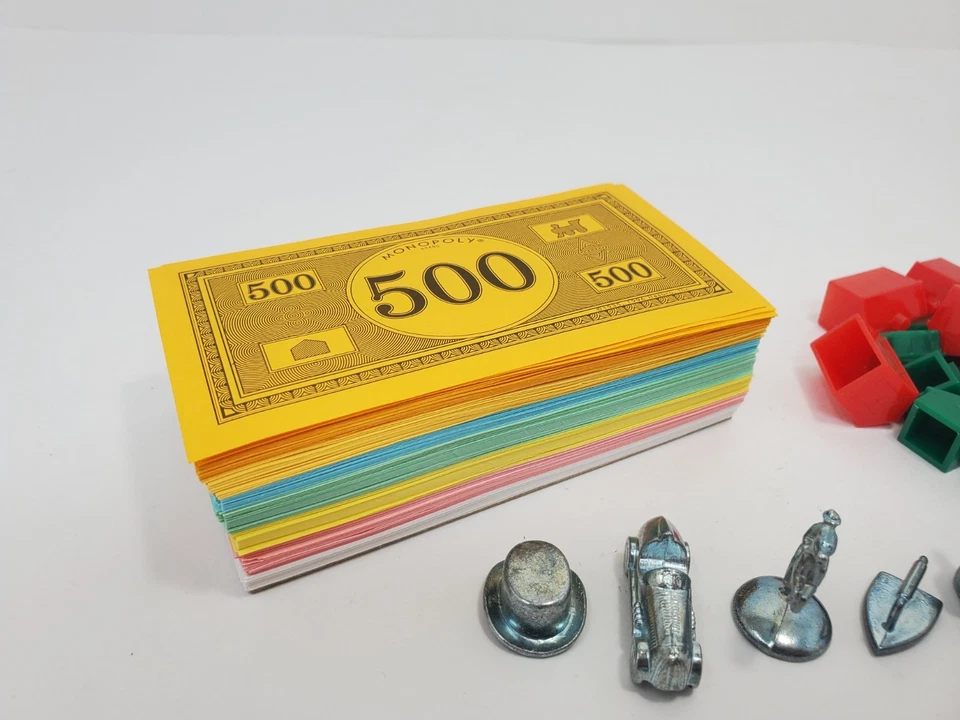 Repuesto Monopoly 11 Piezas Fichas de Peltre Casas Dinero Hoteles Foto 2 de 4