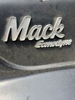 Mack DM600 Left/Driver Emblem - Used | P/N 27RU2127