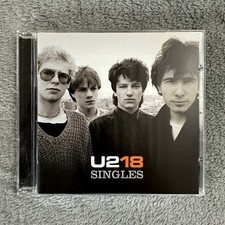 U2: "18 Singles" CD album, with bonus track (2006) - near MINT