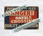 premier feed Danger cattle crossing tin sign