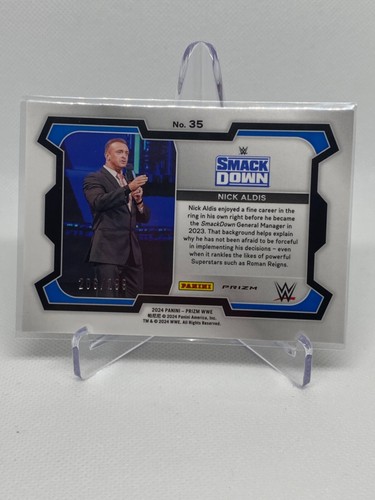2024 Panini Prizm WWE /299 Red #35 Nick Aldis - Picture 2 of 2