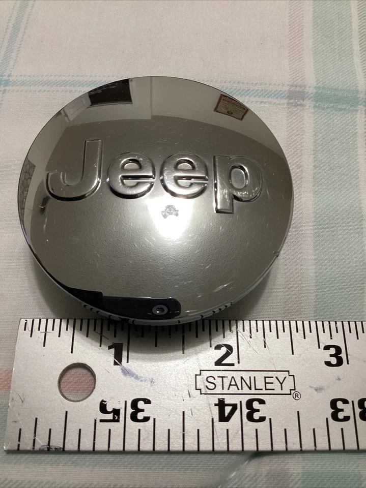 Jeep Grand Cherokee 2008-2020 tapa central 1LB77TRMC 2,5" cromo fabricante original Foto 2 de 4