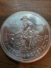 A 1985 Engelhard 1oz Silver American Prospector Round