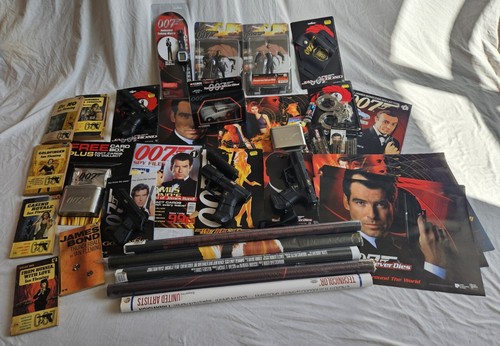 James Bond collection inc, magaz, posters, books, watch, Walthers, handcuffs
