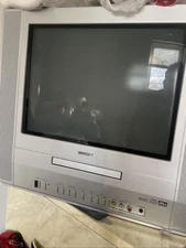 Toshiba TV/DVD Combo Gaming dts. Note DVD DOESN’T OPEN UP.