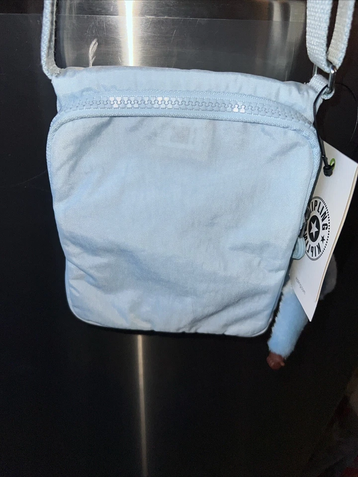 Kipling Nuevo Bolso Bandolera Eldorado Pequeño Plateado Liso Azul Desmayado Nuevo Con Etiquetas Foto 3 de 4