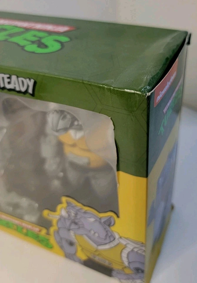 Figura NECA Teenage Mutant Ninja Turtles Super Bebop & Mighty Rocksteady 7" Foto 3 de 4