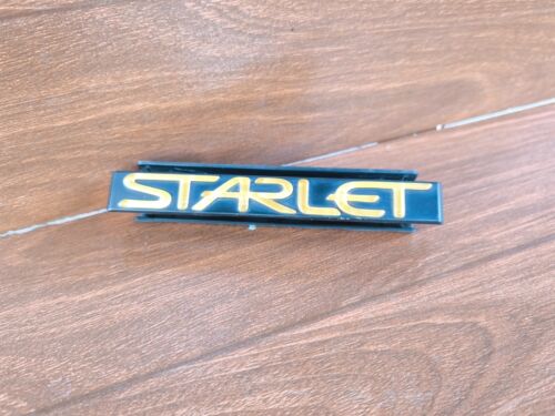 Toyota Starlet EP91 1997 Front Grille Emblem Badge c/w Bracket JDM OEM 753211037 - Picture 16 of 19