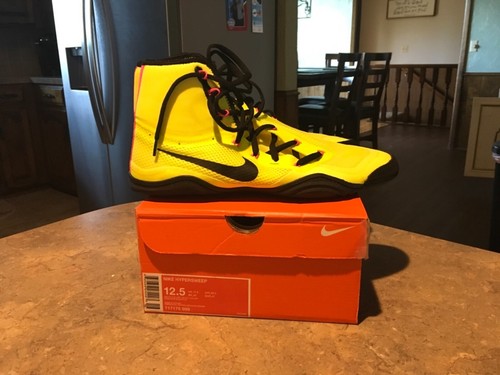 nike yellow and black shoes