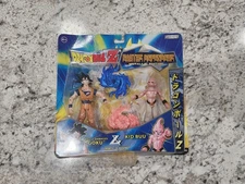 Dragon Ball Z Jakks Battle Damage Goku & Kid Buu Earths Defenders Metallic New