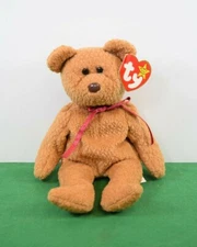 TY - The Beanie Babies Collection - "Curly" The Teddy Bear. In mint condition.