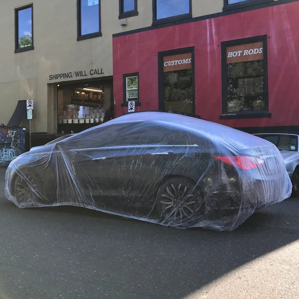 2件装透明塑料临时通用一次性汽车罩雨尘车库  — 第 2/4 张图片