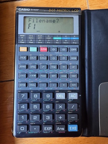 Casio FX-4500P scientific calculator programmable 2 lines with manual - 第 2/9 張圖片