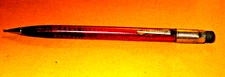 VTG. RED SCRITO K770 TRANSLUCENT W/FARMERS UNION OIL CO.