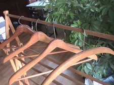 4 vintage wooden hangers