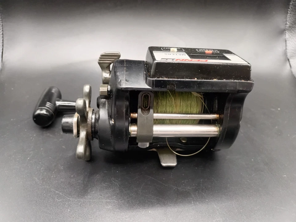 Carrete de pesca con contador de línea digital Penn 875 LC de colección *funciona/necesita servicio* Foto 4 de 4