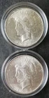 Two 1923 $1 Peace Silver Dollars in Capsules