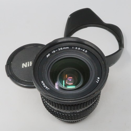 Lente zoom ancho Tokina AF 19-35 mm f/3,5-4,5 montura Nikon F - Imagen 1 de 8