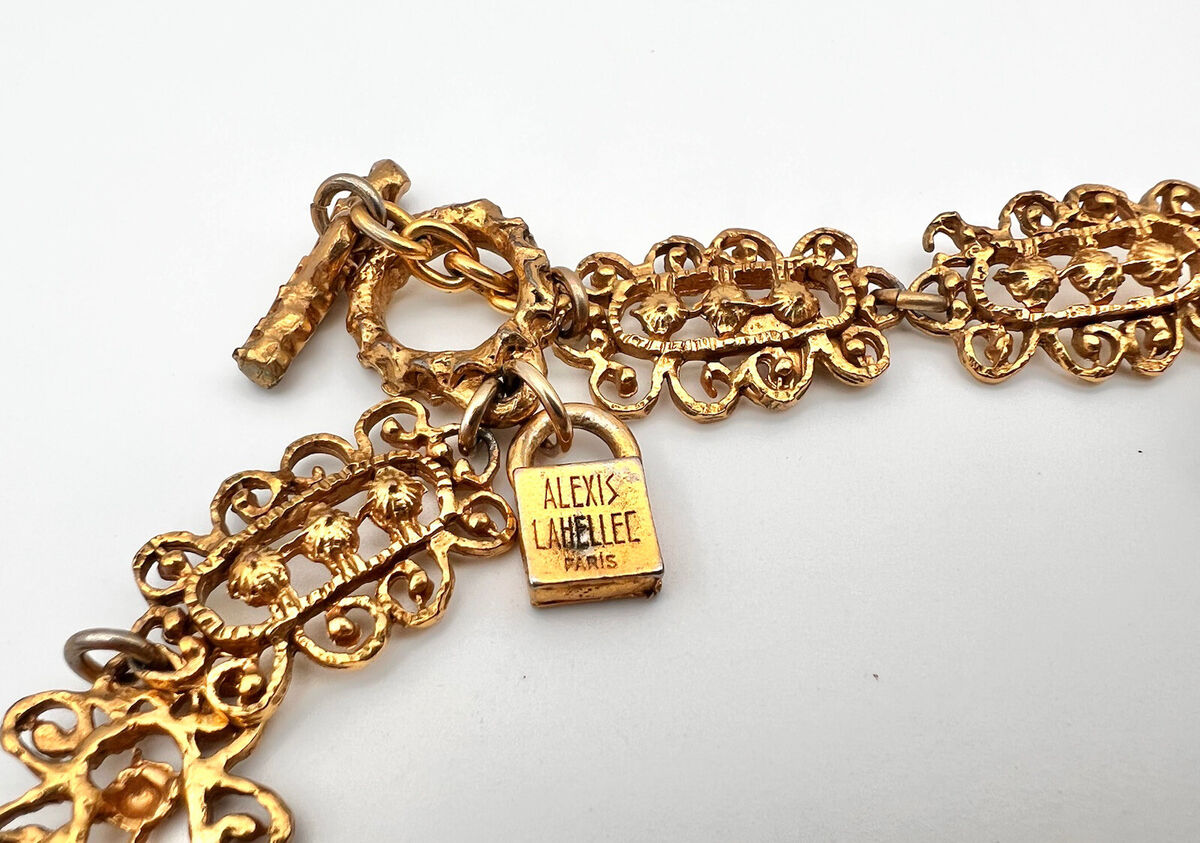 Vtg Alexis Lahellec Paris Gold Tone Molded Blue Glass Twist Vtg Alexis Lahellec Paris Gold Tone Molded Blue Glass Twist