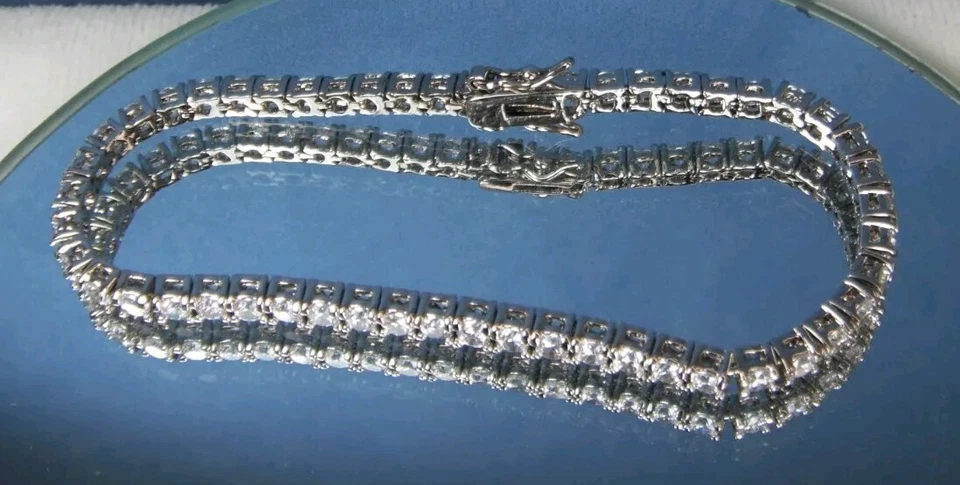 Brazalete tenis Gold Coast enchapado en platino cristal transparente Foto 3 de 4