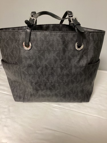 Bolso de Mano Michael Kors Jet Set Signature Negro - Imagen 5 de 12