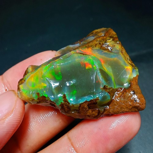 90ct Ethiopian Welo Opal Rough – Vivid Neon Fire, Multi Fire Rough - 42x33x15 mm - Picture 9 of 10