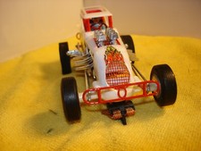 Vintage 77 "Lucky Larry" dirt Midget Racer 1/24 slot car offered by MTH