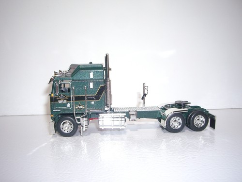 DCP PRIMERA MARCHA 1/64 KUHNLE KW K100 CABINA AERODINÁMICA CON CISTERNA NEUMÁTICA T 3 CONTENEDORES HEIL - Imagen 5 de 11