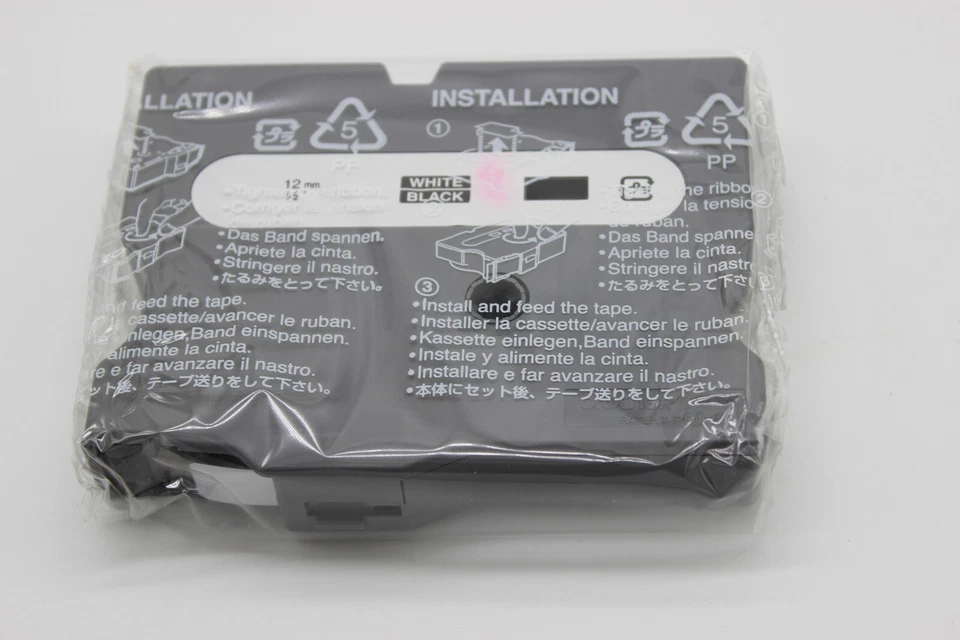 Genuine Brother TX-335 - 12mm x 15m Tape, White on Black, NOS - image 4 of 4